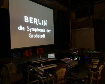 The opening titles of the film are on screen with our equipment set up in front, ready to go.